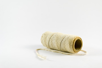 Fototapeta na wymiar thread roll isolated on white background