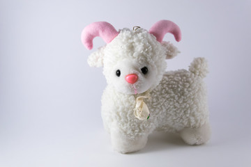 sheep doll isolated on white background