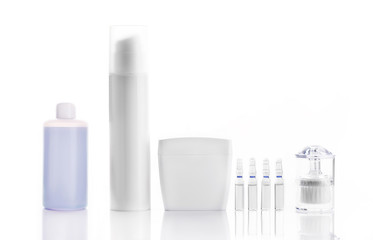 Blank cosmetic tubes on white background. Place for your text.