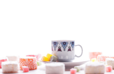 traditional oriental nougat with turkish coffee on a wicker tray