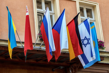 Country flags.
International country flags on the facade of hotel building