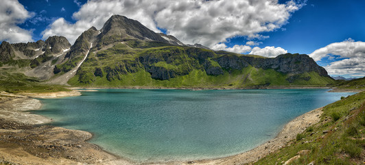 Fototapeta na wymiar Mountain glacial lake in a great landscape