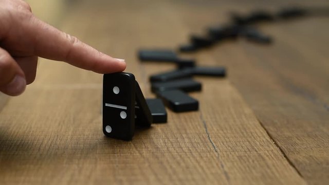 Stopping domino effect