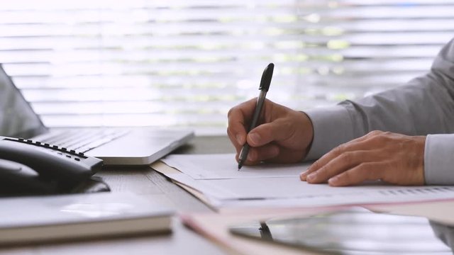 Businessman reviewing his report