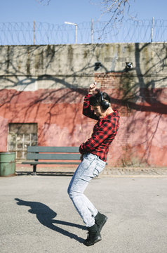 Young woman during krump break dance in Williamsburg, Brooklyn