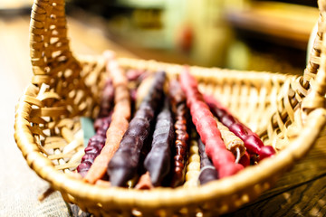 Traditional Caucasus (Georgia) dessert churchkhela. Nuts in grape juice.