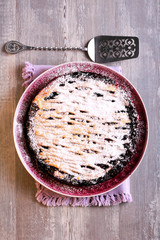 Mixed berry lattice toping pie on plate