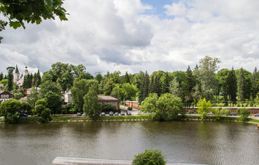 The ancient city of Sergiev-Passad. Lake in the center of the city. Architecture of the century before last. The city is drowning in greenery. View of the city and the lake from the mountain.