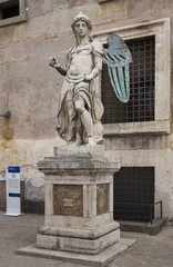 Obraz premium Old statue of Michael the Archangel in yard of Castle of Holy An