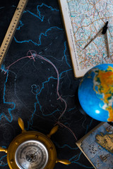 Globe on a black matte background with lights.