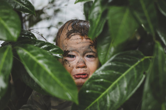 Cute, Sad Toddler Boy Crying In The Bushes With Face Covered In Mud - Funny