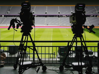 Dual video recording camera in a football stadium