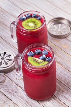 Berry kiwi smoothie in the jars
