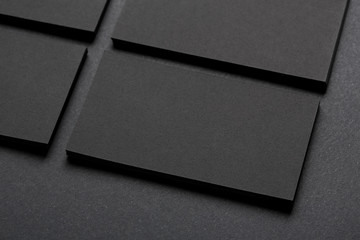blank business cards on black background