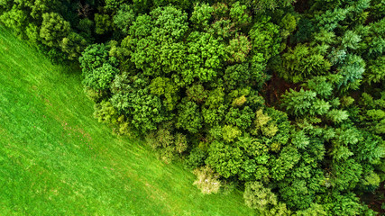 Drone flight in the summer above the are of Aachen with its flields, forest and meadows