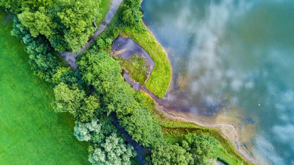 Drone flight in the summer above the are of Aachen with its flields, forest and meadows