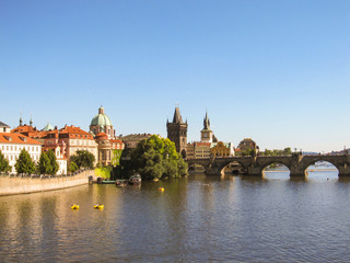 A view of Charles Bridge in Prague in a sunny afternoon