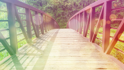 Bridge in the Green Outdoors in a Spring Daywith Bokeh