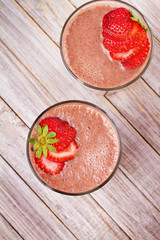 Chocolate strawberry smoothie. View from above, top studio shot