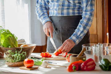 male cooking healthy salad