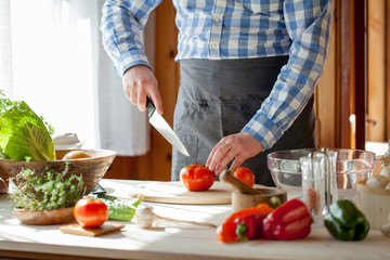 male cooking healthy salad