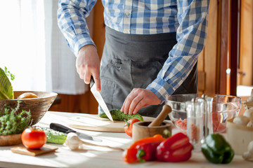 male cooking healthy salad