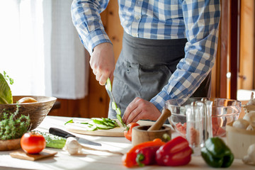 male cooking healthy salad