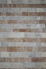 Pattern of the ancient style stone wall with cement.