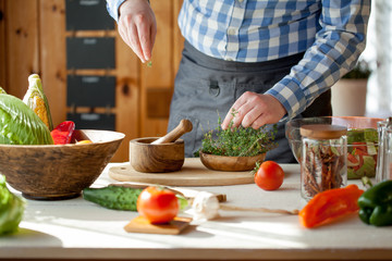 male cooking healthy salad
