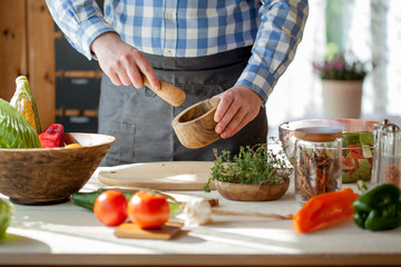 male cooking healthy salad