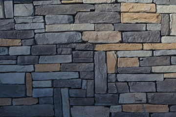 Pattern of the ancient style stone wall with cement.