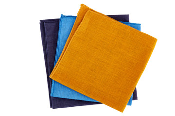 Fototapeta premium Three colorful napkins on white