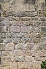 Pattern of the ancient style stone wall with cement.