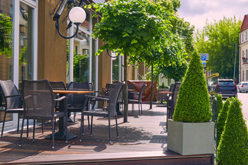 Empty tables of a summer cafe in the city center in Vilnius