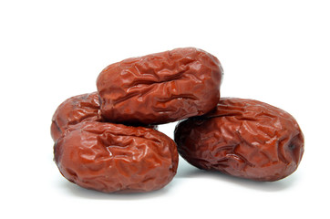 Dried jujube fruits on white background