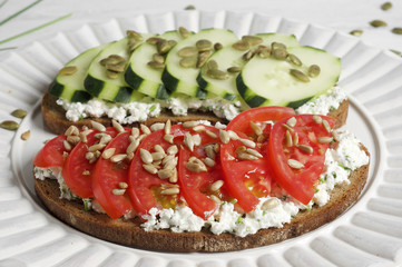 Tomato and cucumber healthy cottage cheese rye bruschetta 