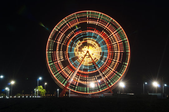 Spinning ferris wheel at  night, Batumi, Georgia.