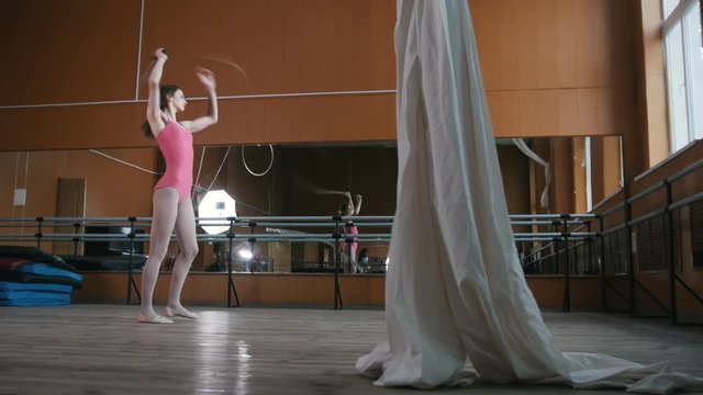 Dance with whip - girl gymnast perform circus exercise - video with sound