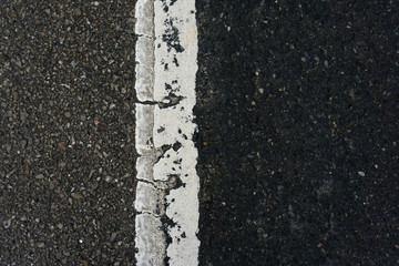 Fototapeta premium yellow line on road texture,old