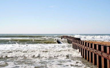 Deteriorating metal breakwater. Atlantic Ocean. North Carolina.
