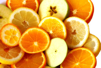 fresh tasty orange, apple and lemon in a white background