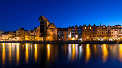 Fototapeta na wymiar View from the river to the old town in Gdansk at night