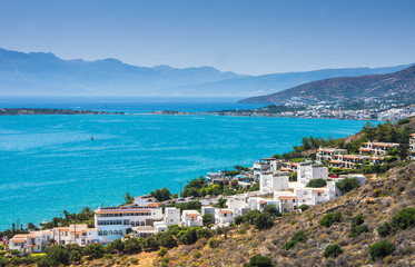 Naklejka na ściany i meble Panoramic view of the town Elounda, Crete, Greece.Paradice view of Crete island with blue water. Panoramic view of Elounda nature
