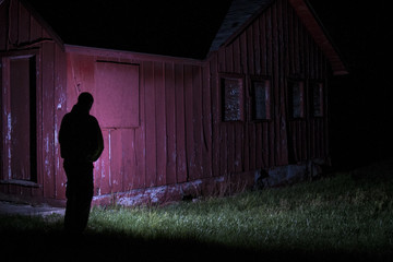 Barn silhouette at night