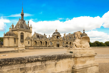 Obraz premium The castle of Chantilly is historical and architectural monument, France.