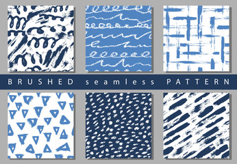 Set of Vector colorful seamless pattern with brush strokes and dots. Blue color on white background Hand painted grange texture. Ink geometric elements. Fashion modern style Unusual kid school collage