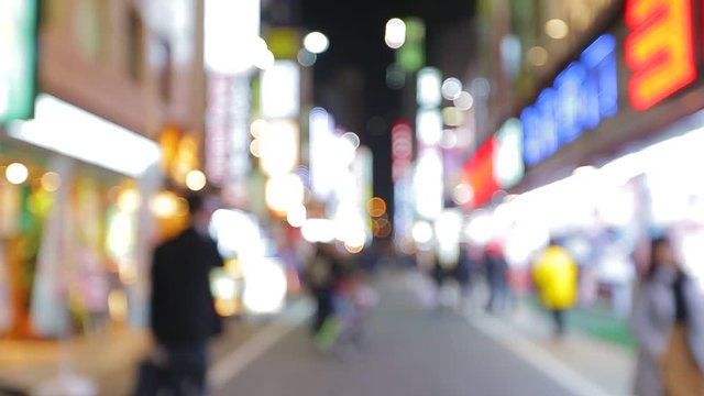 People walking in city night