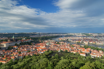 Fototapeta na wymiar View of the Petrin Hill, Mala Strana (Lesser Town) and Old Town districts and beyond in Prague, Czech Republic, from above. Copy space.