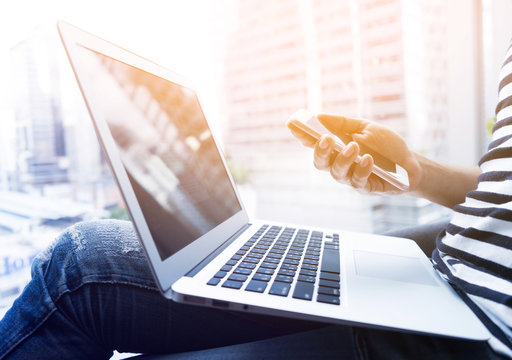 Businessman working with smartphone and laptop.business technology lifestyle.strategy marketing planning process.searching data information concept.multitasking lifestyle