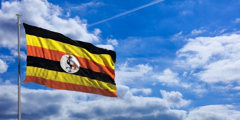Uganda waving flag on blue sky. 3d illustration